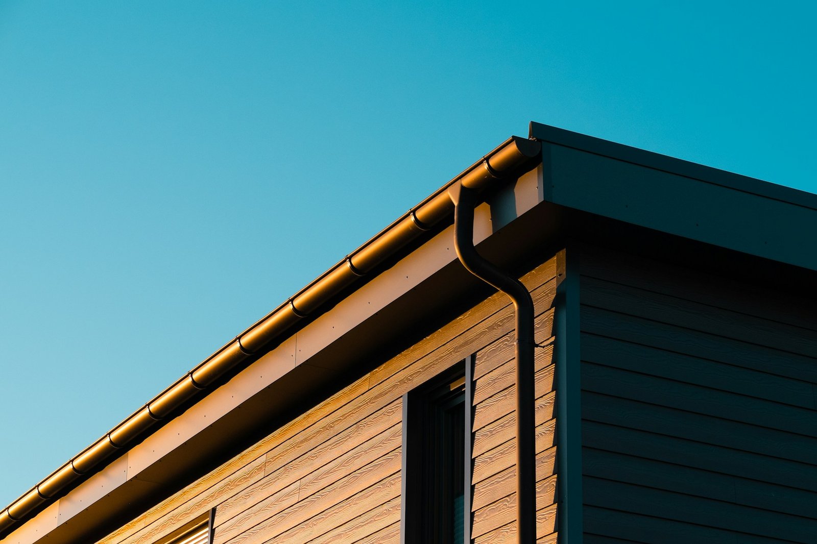 Modern building exterior with clear blue sky